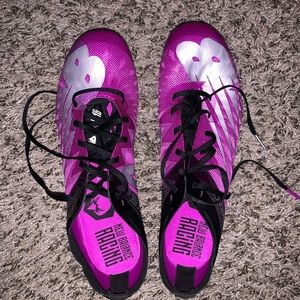 Purple New Balance track spikes